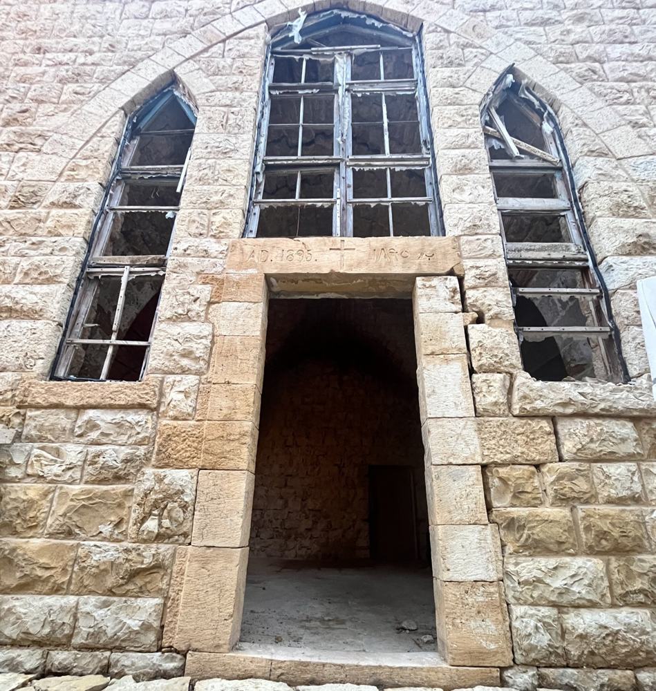 Carved AD 1895 cornerstone inscription with cross, Qasr Noun